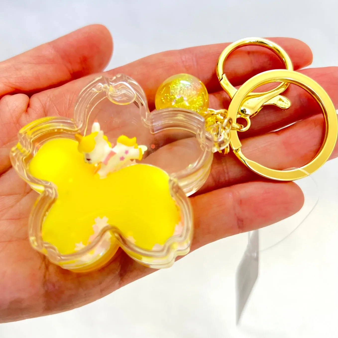 12079 UNICORN FLOWER FLOATY KEY CHARM-12