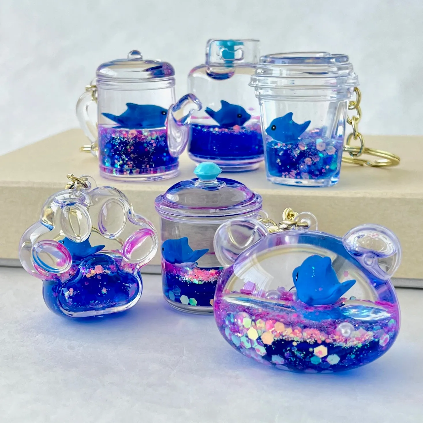 12129 BLUE DOLPHIN COMBO FLOATY KEY CHARM-12