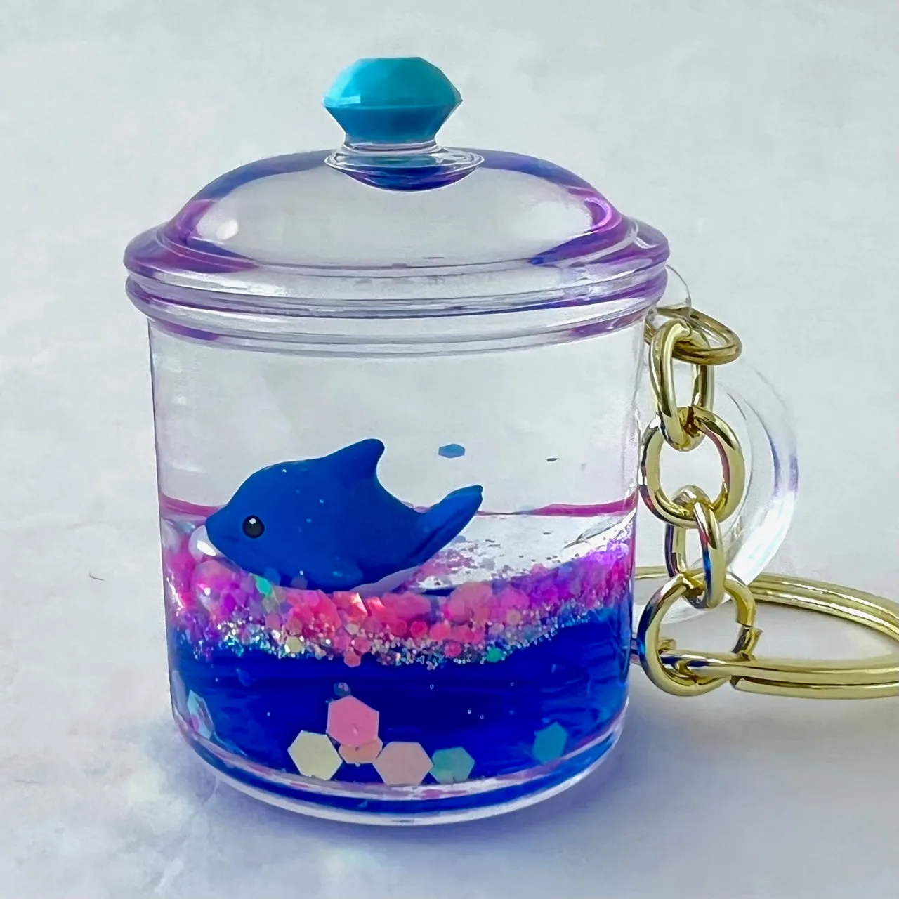 12129 BLUE DOLPHIN COMBO FLOATY KEY CHARM-12
