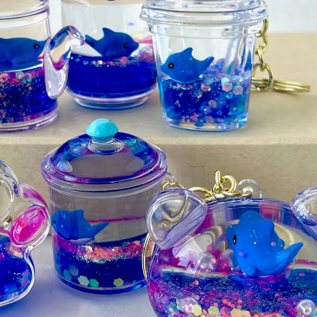12129 BLUE DOLPHIN COMBO FLOATY KEY CHARM-12
